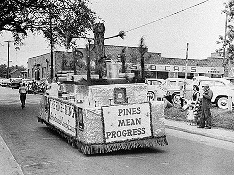 A parade float, pictured in the late 1950s, progresses through Swainsboro, the seat of Emanuel County, during the Pine Tree Festival. Forest-related industry was an economic mainstay for the county from the 1870s through the 1960s. © Courtesy of Georgia Archives, Vanishing Georgia Collection